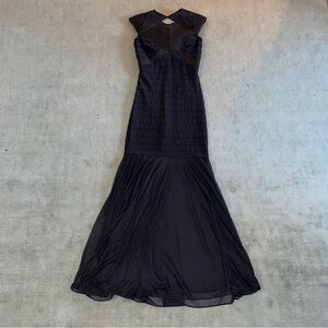 Black maxi dress with mesh overlay and cut-out back